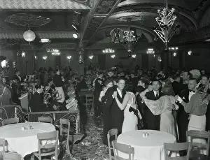 Couples Dancing in Dining Room