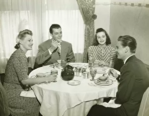 35 39 Years Collection: Two couples having dinner, (B&W)