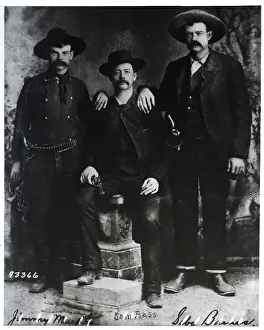 Three Cowboy-Dressed Men