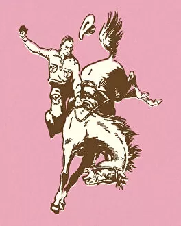 Horseback Riding Collection: Cowboy Riding a Bucking Bronco