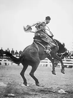 Endurance Prints: Cowboy Riding Horse In Rodeo