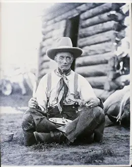 Legs Crossed Prints: Cowboy Seated Indian Style Eating