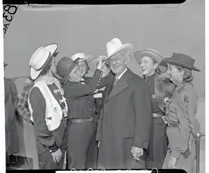 Cowgirl Placing Hat on Alfred E. Smith