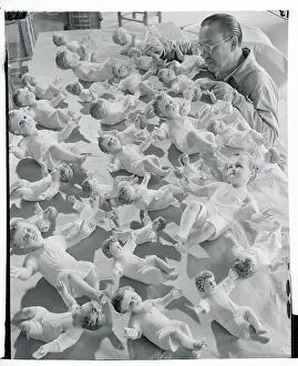 Craftsman Working on Statuettes