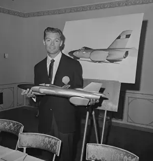 Racecar Prints: Craig Breedlove Displaying Model of Racing Car