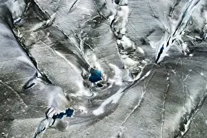 Bernese Alps Prints: Crevasses with small glacial lakes