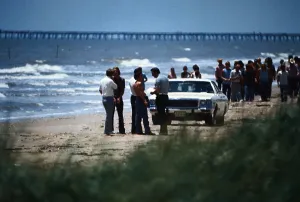 Brooks Prints: Crowd on the Beach During Body Search