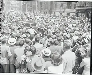 Frenzy Prints: Crowd Gathering Around an Automobile