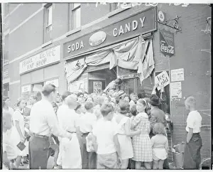 Crowd Gathering Outside of a Stationary Store