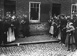 Regiment Prints: A crowd inspects damage to a house by a regiment of soldiers at Donegal Quay