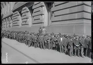 Crowd of Men Waiting on Line