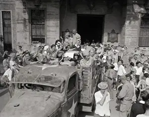 Manila Prints: Crowd Standing Around Truck of Female Nurses