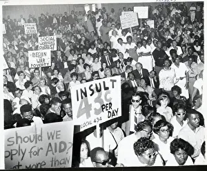 Crowd of Striking County Workers with Signs