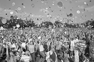 Stunt Prints: Crowd Throwing Frisbees into the Air