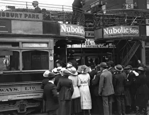 Waiting In Line Prints: Crowd For Trams