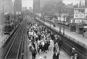Crowd Traveling by Foot over Bridge