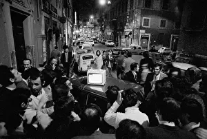 Portable Prints: Crowd Watching Election Results on TV