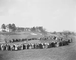 Crowd Watching a Golf Tournament