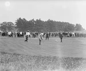 Prints of (Original Caption) photo of the gallery watching the match between Ted Ray and Hobens as they putt on the green Swing Through History: Crowd Watching Golf Tournament