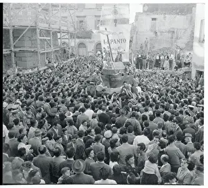 Crowds Gathering Around a Wine Vessel