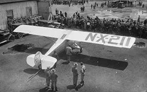 Crowds Surrounding Charles Lindbergh Airplane on the Ground