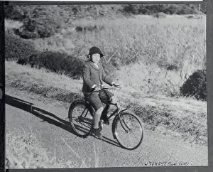Akihito Prints: Crown Prince Akihito Riding Bicycle on Palace Grounds