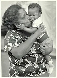 Socialist Prints: Cuban Grandmother Kissing Her Grandson