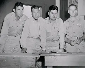 Curtis E. LeMay with Three Generals Going over Plans