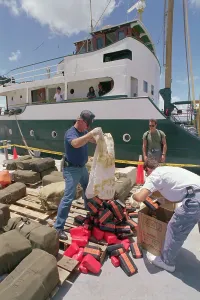 Key West Prints: Customs Agents Unloading Bag of Drug Smuggling