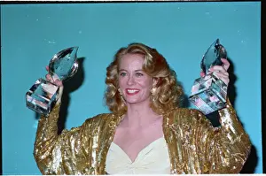 Cybill Shepherd Holding Awards