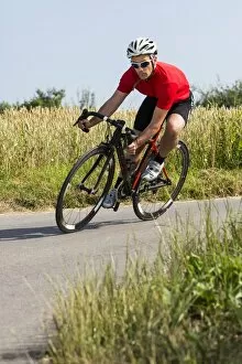 Images Dated 14th July 2013: Cyclist, 44 years, riding a racing cycle, Winterbach, Baden-Wurttemberg, Germany