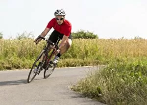 Images Dated 14th July 2013: Cyclist, 44 years, riding a racing cycle, Winterbach, Baden-Wurttemberg, Germany