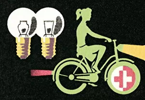 Images Dated 14th October 2003: Cyclist and light bulbs