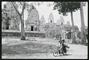 Disrepair Prints: Cyclists Pictured Riding Through the Bayon