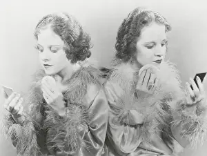 Daisy and Violet Hilton Applying Makeup