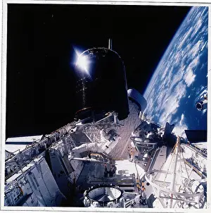 Dale Gardner Works on Satellite in Orbit