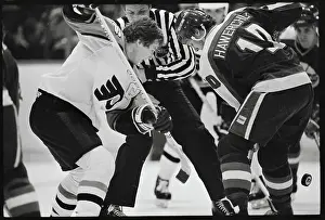 Dale Hawerchuk and Bobby Clarke Facing Off