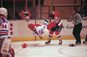 Dale Hunter Flipping Normand Rochefort to the Ice