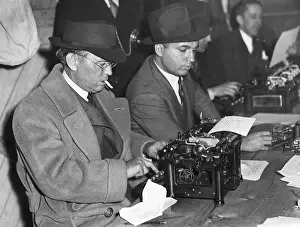 Damon Runyon Using Typewriter