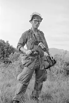 Dana Stone Carrying Cameras on his Neck