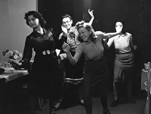 Prints of 10th January 1942: Dancers rehearsing their moves. Original Publication: Picture Post - 952 - A Girl Goes Into War Industry - pub.1942 (Photo by Haywood Magee/Picture Post/Hulton Archive/Getty Images) Discover the Vision of Haywood Magee – A Master of Mid-Century British Life: Dance Rehearsal