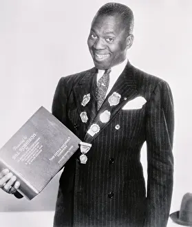Dancer Bill Robinson with His New Bound Movie Book
