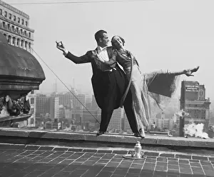 Dancing Couple Performing on Rooftop