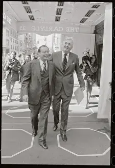 Daniel Moynihan and Alfonse D'Amato Walking to Conference