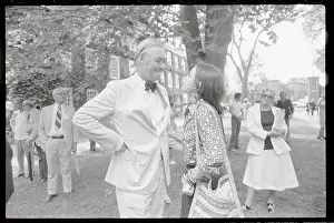 Daniel Moynihan with Right Hand on His Waist and Talking with His Daughter