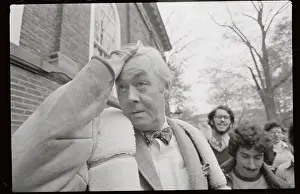 Daniel Moynihan Runs Fingers Through Hair While Speaking to Reporters