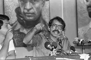 Candidate Prints: Daniel Ortega Gestures at Press Conference