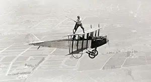 Daredevil Al Wilson Golfing on Biplane