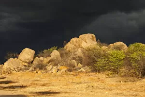 Dark storm front over rocks, Kaokoland, Kunene, Namibia