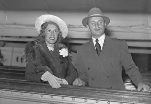 Darryl Francis Zanuck Prints: Darryl Zannuck Posing with Wife